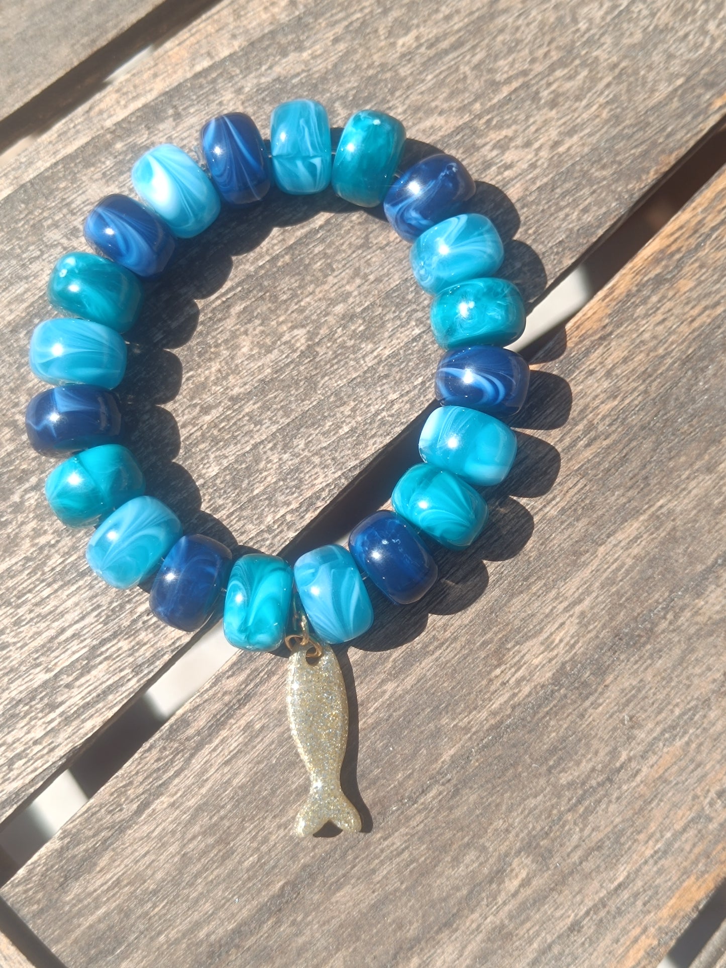 Bracelets élastiques bleu poisson doré